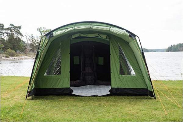 The front view with the completely open vestibule/porch. Dual front windows with PVC panels are visible.