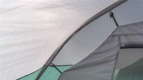The inner tent is a polyester taffeta and it is attached to the shell.