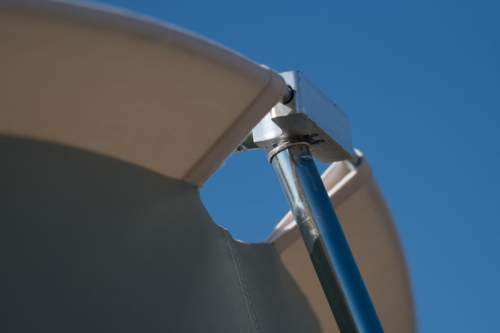 Here is one of the two vertical (leg) poles and its connection to the T-shaped springbar roof pole.