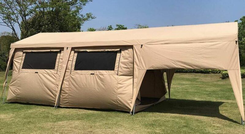 Side view with rolled up windows and the view of the awning.