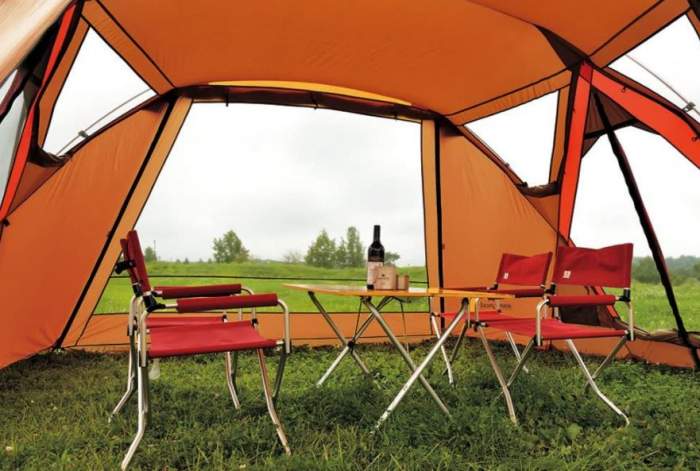View from inside with camping furniture.